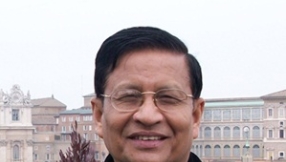 Archbishop calls refugees back to Burma