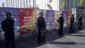China targets \'wild imams\' in mass public sentencing