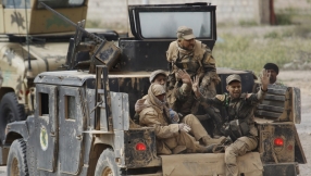 Snipers and booby-traps slow Iraqi army progress in Tikrit