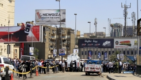 Militants attack church and police in Egypt, one policeman dead