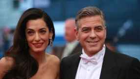 George and Amal Clooney get cozy at \'Our Brand Is Crisis\' premiere