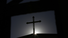 Chinese Christians hold protest on church roof to protect cross