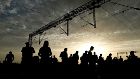 Migrants: East Europe divided as thousands pour in