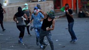 Israeli couple shot dead by Palestinian gunmen leaving four orphaned children