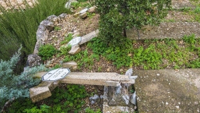 Grave crosses desecrated in cemetery near Jerusalem