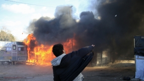 Tear gas, rubber bullets and water cannons: Clashes break out as Calais Jungle demolition begins