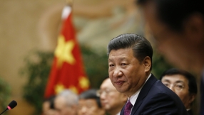 China's conservatives welcome Xi's new era, but say he is not the new Mao