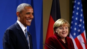 \'We can\'t hide behind a wall\': Obama addresses huge crowd of Protestant Christians in Germany