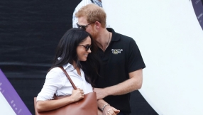 Prince Harry and Meghan Markle display PDA at Invictus Games in Toronto