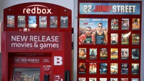 Disney sues Redbox for 'illegal' resale of digital movie codes; seeks $150,000 per title in damages