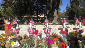 Carpenter erects wooden crosses in honour of shooting rampage victims