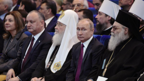 Vladimir Putin accuses Ukraine of meddling in Orthodox faith, warns Russia will 'protect freedom of religion' 