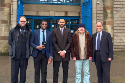 Karandeep Mamman outside Wolverhampton Crown Court with friends.