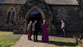 Church rededicated to God after apparent atheist hate crime attack