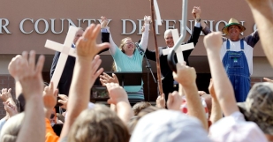 Gay couple already got their marriage licence but still want more punishment for jailed Christian clerk Kim Davis